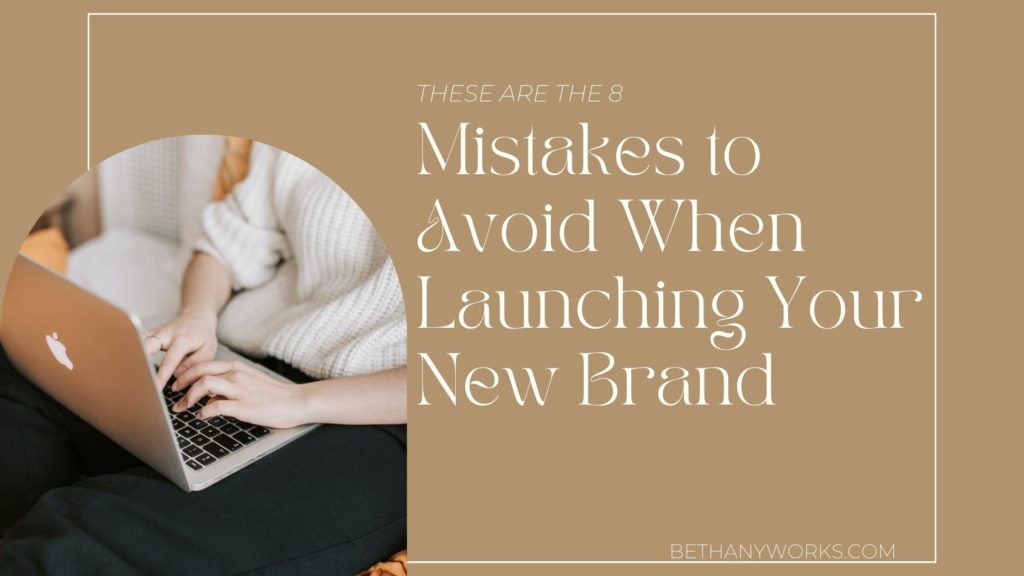 A brown background with a small arched image of a person typing on their computer on the left. Written across the middle is "These are the 8 mistakes to avoid when launching your brand"