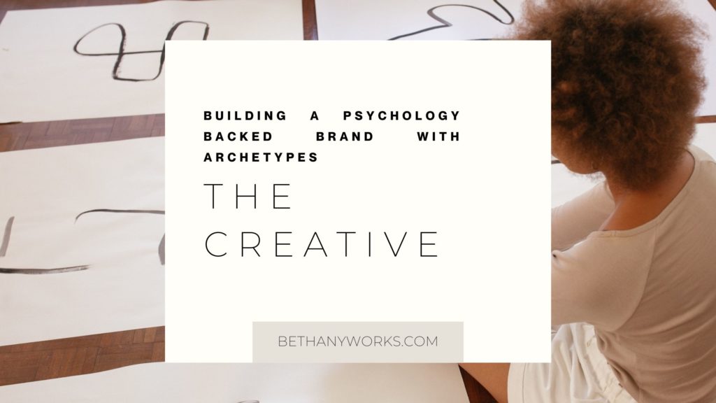 image of someone drawing on paper with a cream box laid on top that reads building a psychology backed brand with archetypes the creative