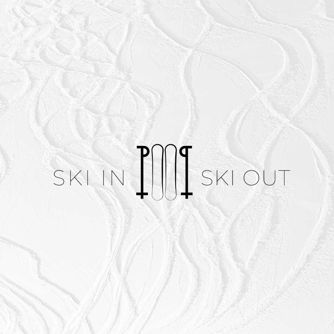 White background with small paint strokes and a logo on the middle that says "Ski in. Ski out".