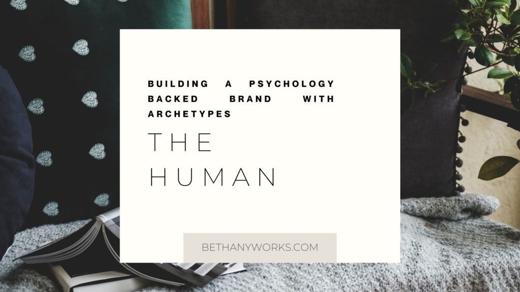 Books laid out on a couch with a box over the image and text that reads "Building a psychology back brand with archetypes. The Human archetype"