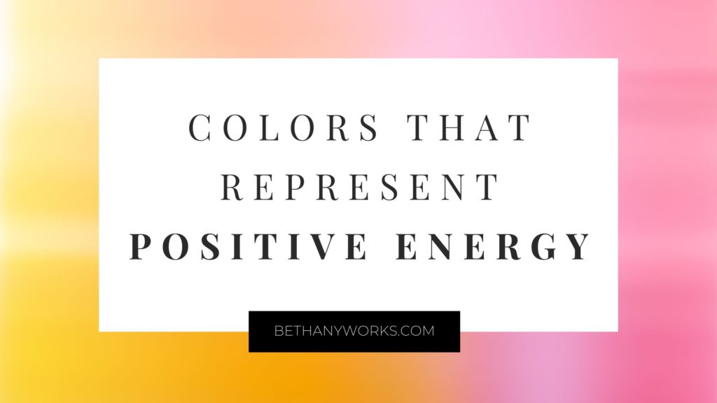 Black text on a white color block with a yellow to orange to pink gradient behind. Black text is on the white box that says, "Colors that represent positive energy."