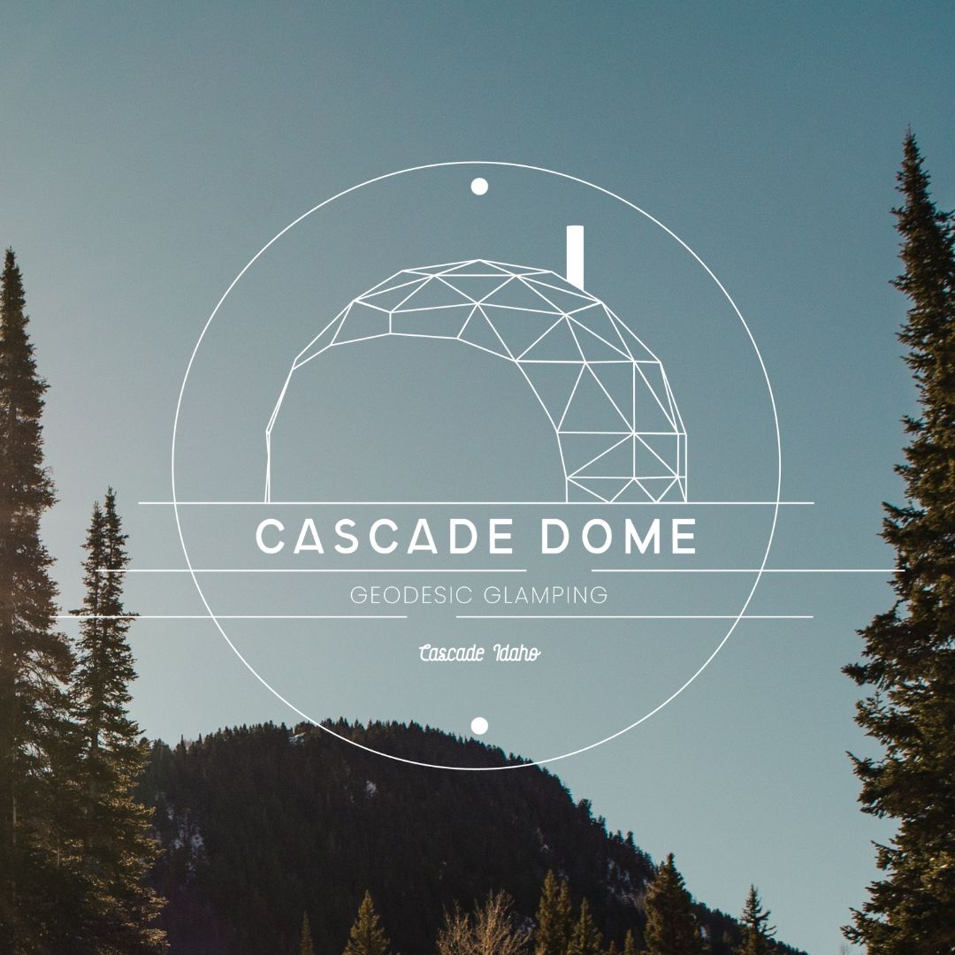 image of a mountain with trees around it and a logo overlaid that says "cascade dome. geodesic glamping. cascade idaho"