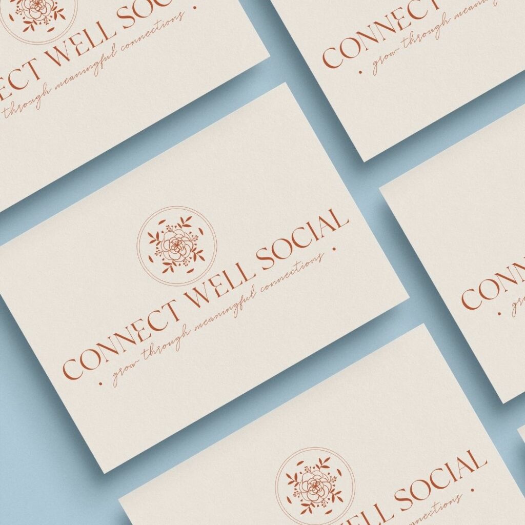 Business cards laid out in a grid with a logo on them that says "Connect Well Social. Grow through meaningful connections."