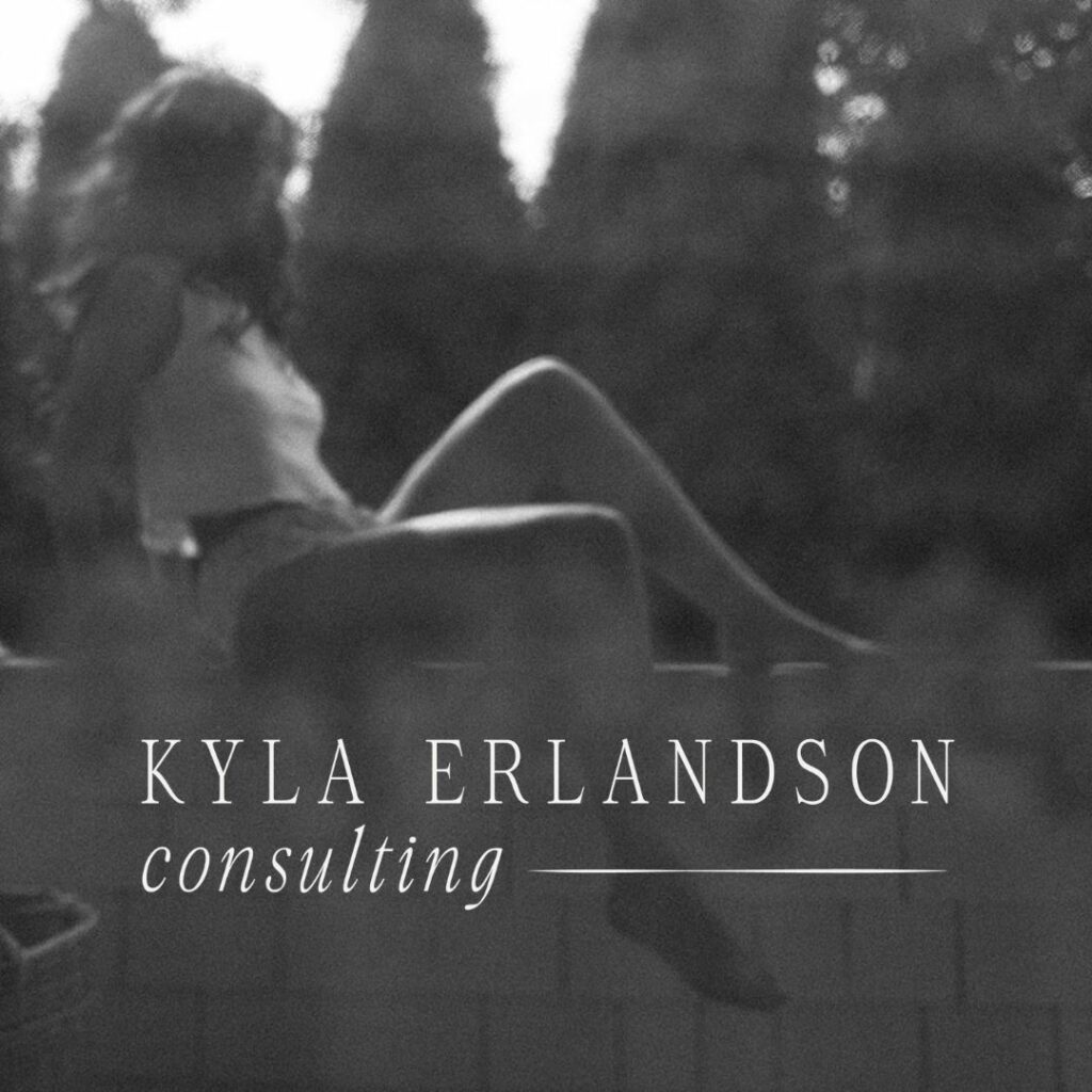 Image of a woman sitting along the edge of a wall. On the bottom of the image is a logo for "Kyla Erlandson Consulting".