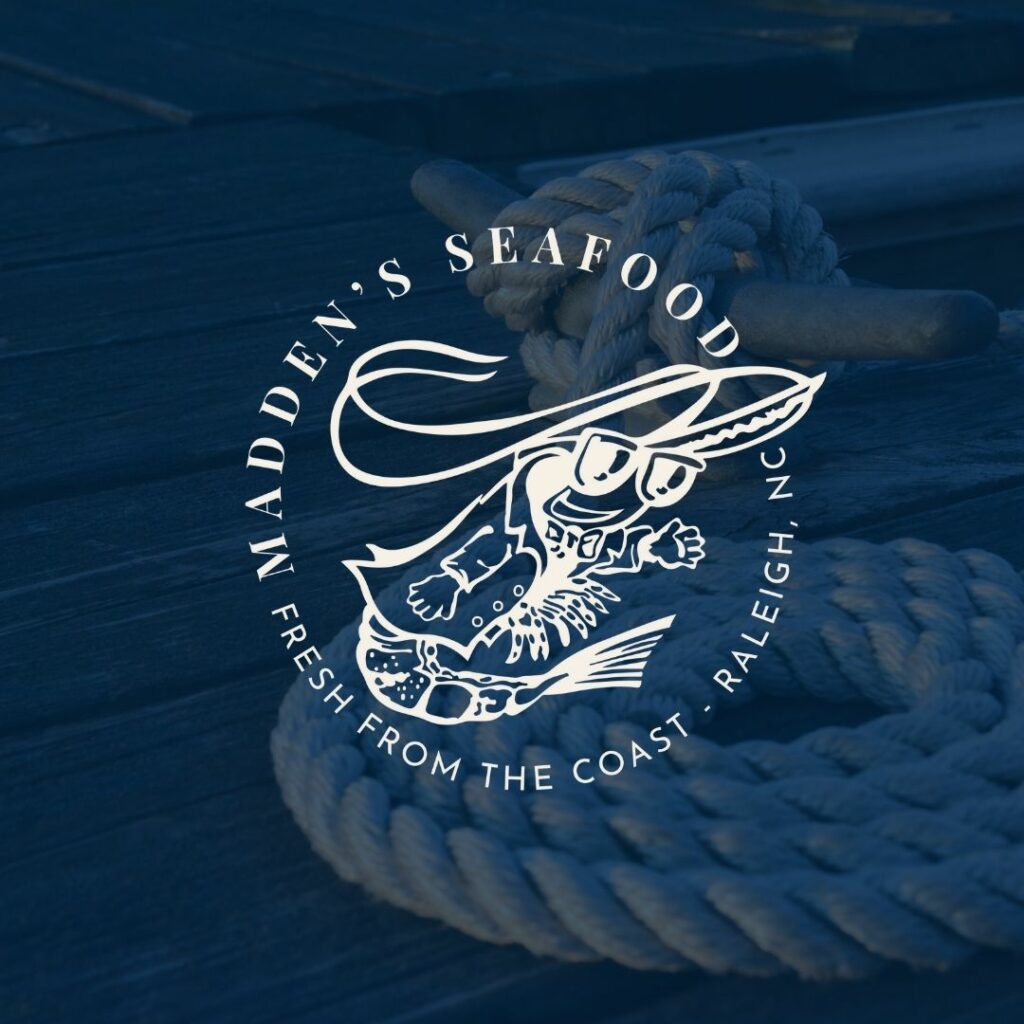 Image of rope around an anchor on a dock with a dark blue overlay on the image. On top is a logo that reads "Madden's Seafood. Fresh from the coast - Raleigh, NC".