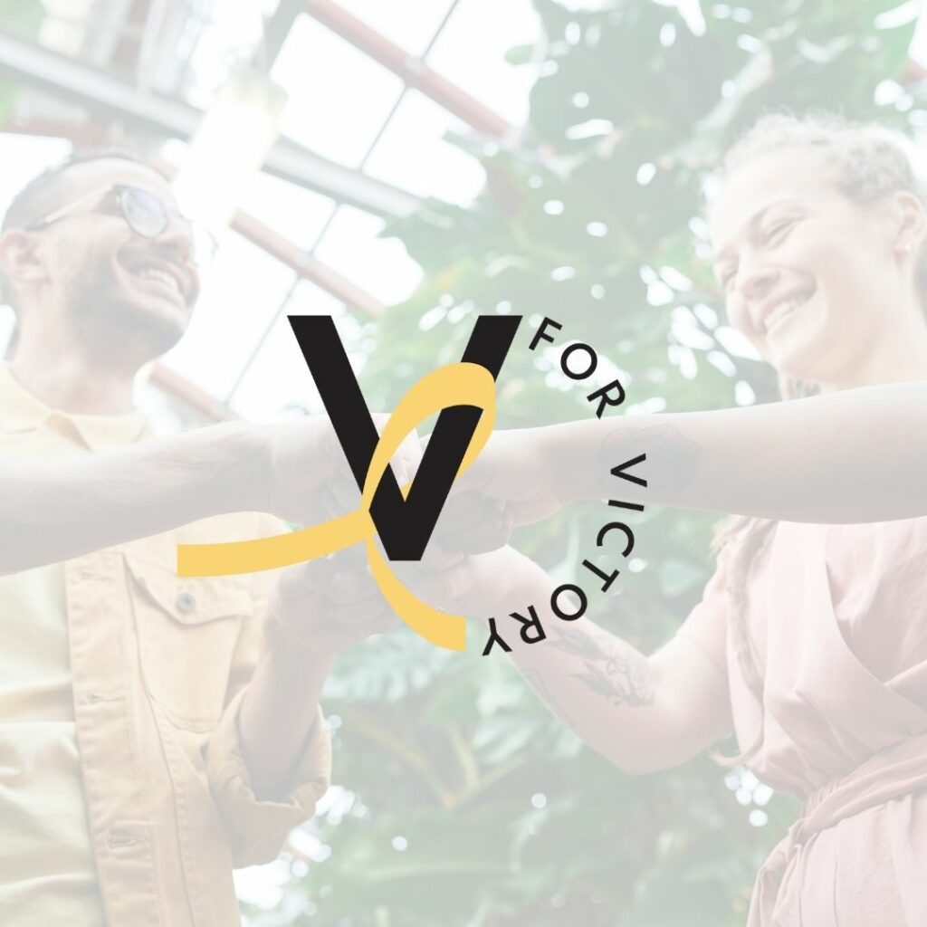 Image of two people fist bumping with a light overlay over the photo. On top is a logo that says "V for Victory".