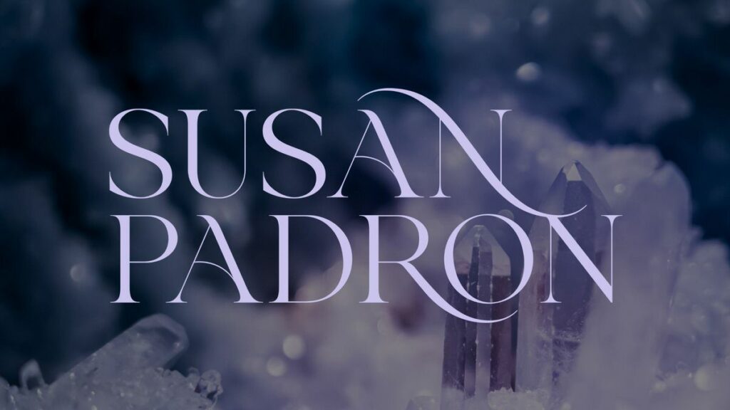 Crystals sticking up with a logo on top that says susan padron 