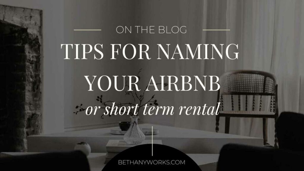 image of a small sitting area with a stone fireplace with a black overlay and text that says "On The Blog. Tips for naming your airbnb or short term rental"