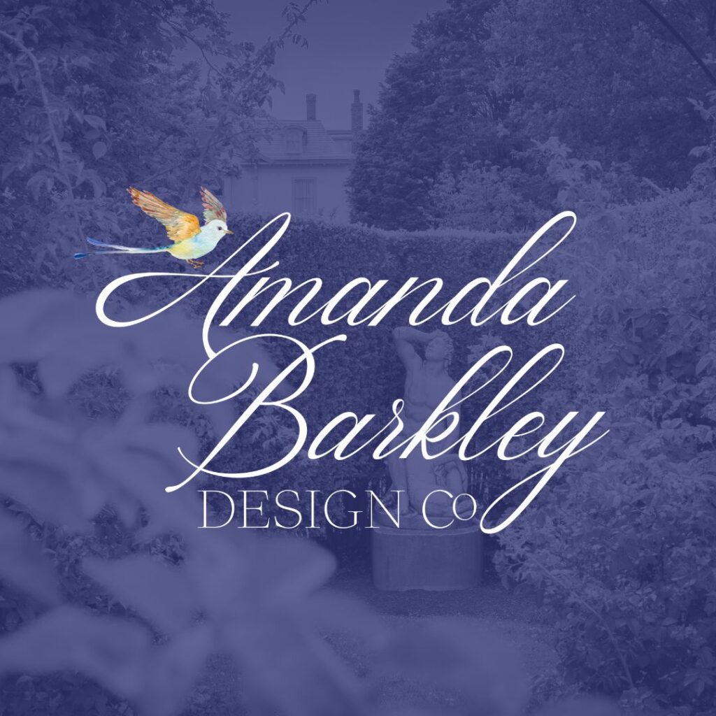 Image of a garden with a statue in it with a purple overlay on the image. On top is a logo for Amanda Barkley Design Co.