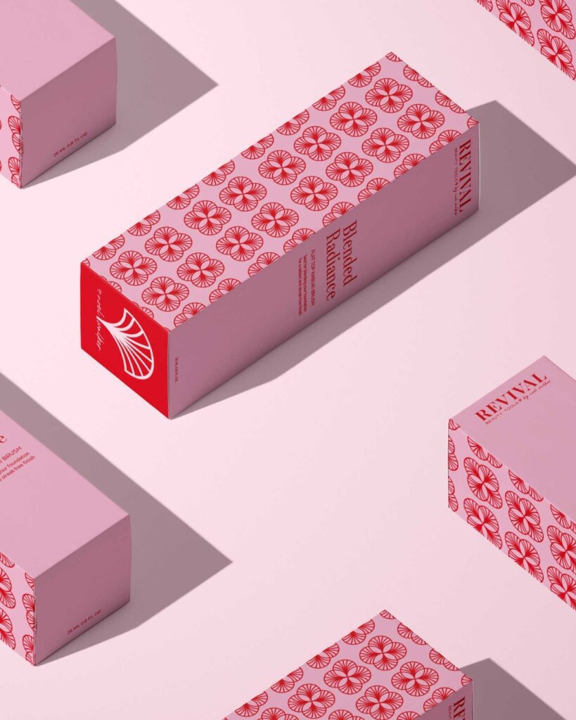 Elegant packaging design for Revival Beauty Tools, featuring a patterned red and pink box for a 'Blended Radiance' product.
