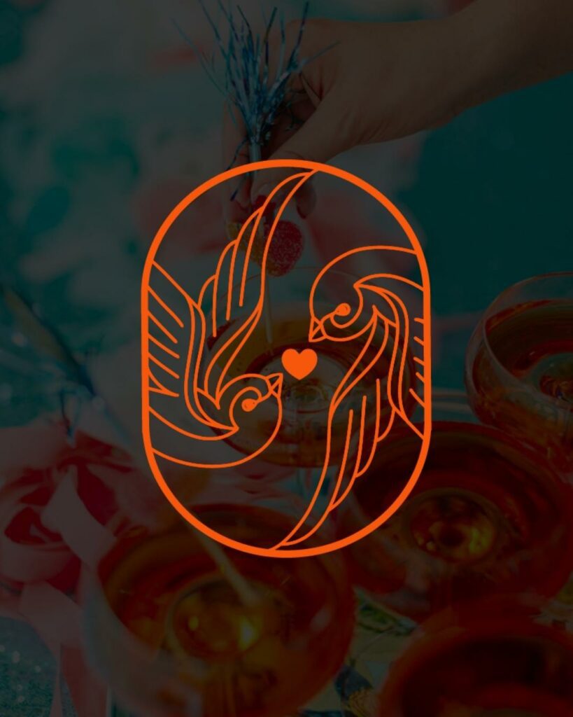A vibrant branding image with an orange heart and two stylized doves.