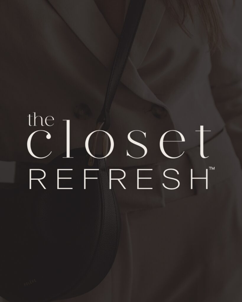 Elegant branding photo for The Closet Refresh, showcasing a high-end black leather bag against a beige suit.