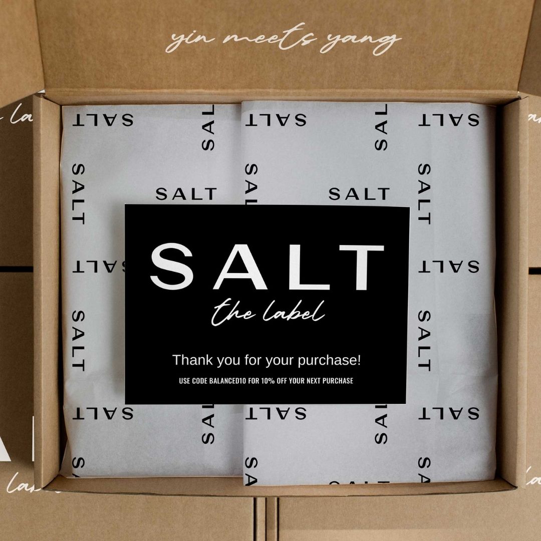 Package design with a paper that says SALT The Label.