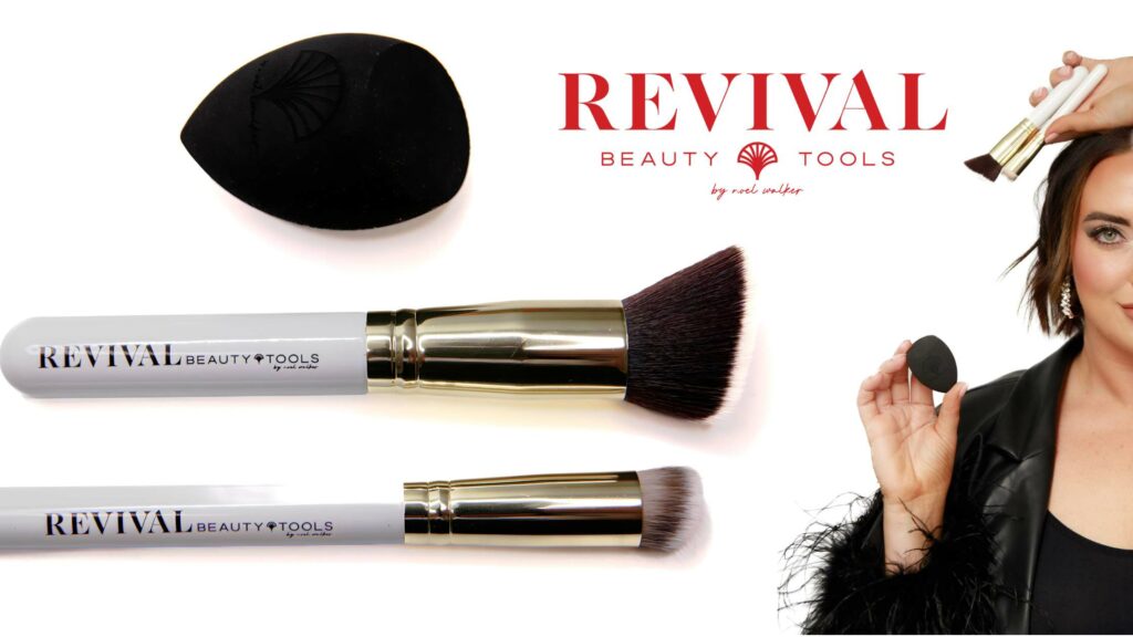 The Revival Beauty Tools collection is showcased featuring a black makeup sponge, two makeup brushes with white handles and black bristles, and a red logo on a white background. A woman holds the sponge and one brush, demonstrating the products' use, against a black feathered backdrop